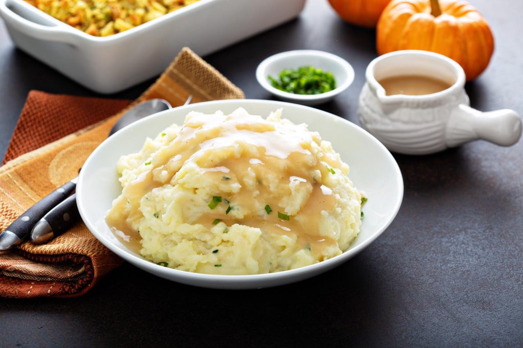 Patate schiacciate al forno